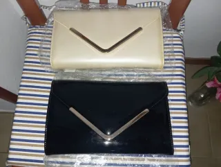 20€ los dos. Bolsos o carteras de mano mujer.