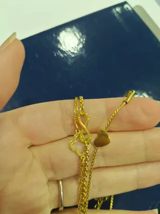 Lote de pulseras doradas