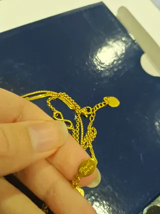 Lote de pulseras doradas