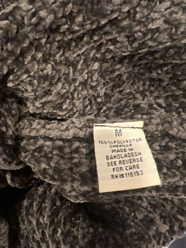 Jersey suave gris cuello alto