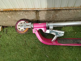 Patinete plegable rosa