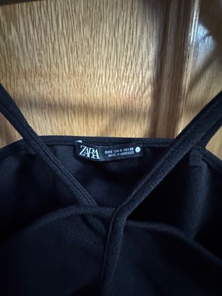 Body negro con escote y tiras