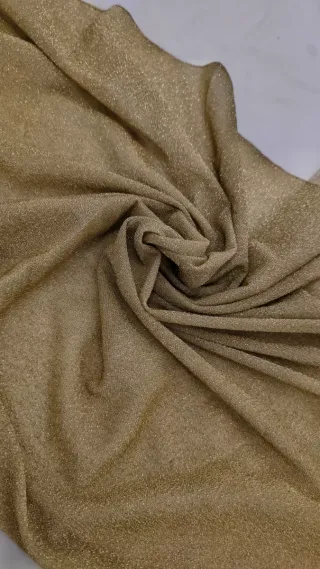 Tela dorada brillante