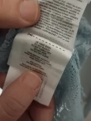 Gorro de lana gris con pompón