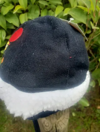 Gorro de lana con orejeras y Tui-Tui