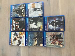 PS4 Slim 500 GB + Mando Rojo + 24 juegos