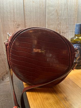 Bolso redondo The Code efecto piel