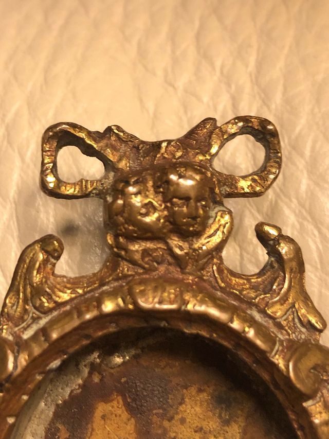 Antica cornice porta reliquie XVI bronzo dorato