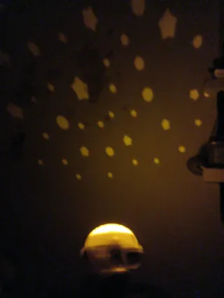 Móvil cuna musical con proyector