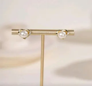 Conjunto de joyas con perlas y corazones