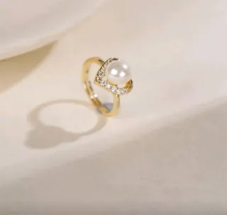 Conjunto de joyas con perlas y corazones