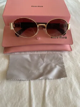 Gafas de sol Miu Miu doradas y marrones