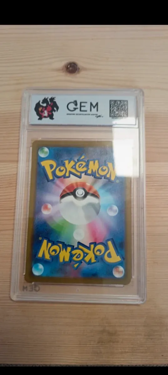 Pokemon Charizard VSTAR 014/172 CEM 10