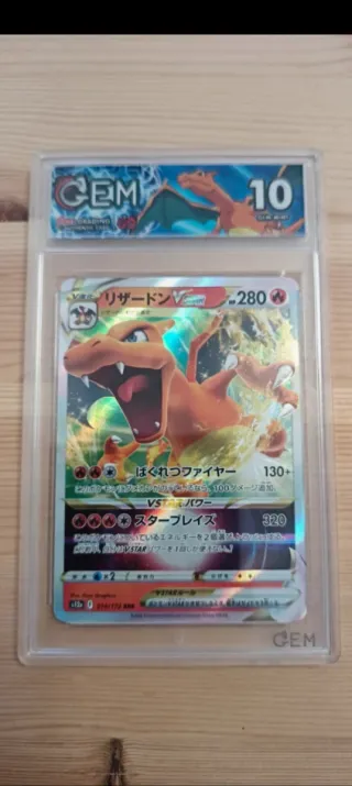 Pokemon Charizard VSTAR 014/172 CEM 10