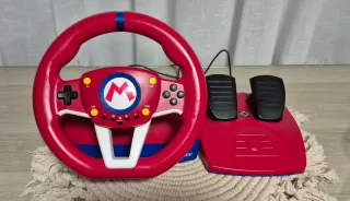 Nintendo Switch + Volante Mario + Juegos