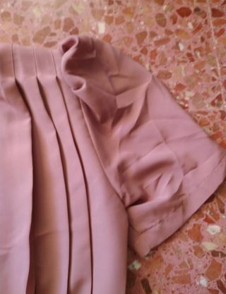 Blusa rosa plisada