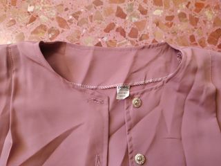 Blusa rosa plisada