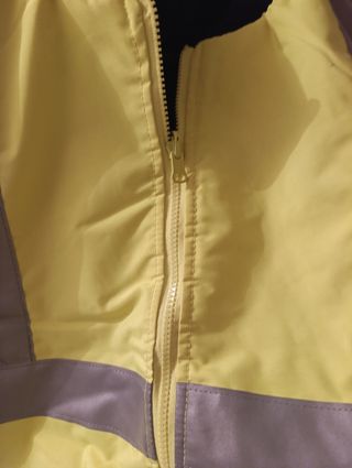 Chaleco acolchado reflectante reversible