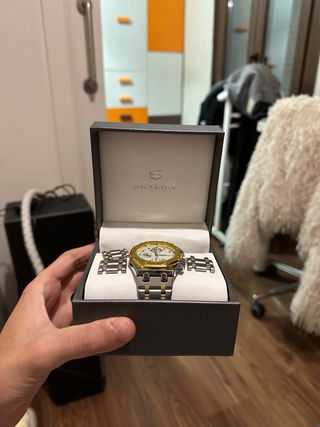 Reloj Skyline Oro y Plata