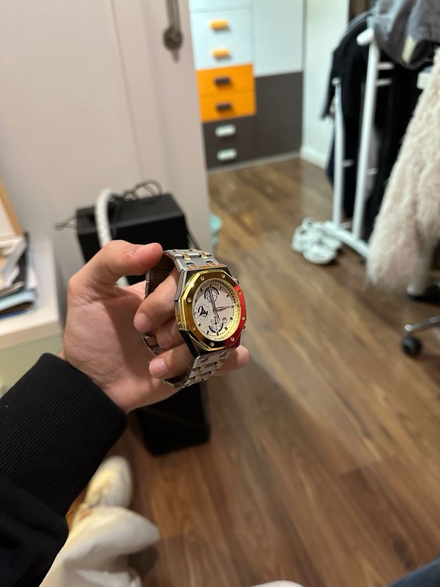 Reloj Skyline Oro y Plata