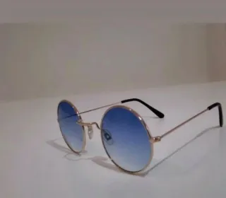 Occhiali da sole rotondi blu e oro