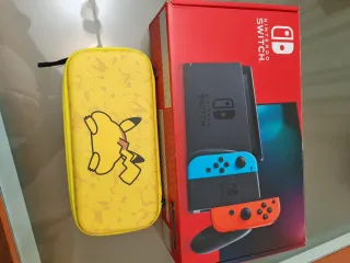 Nintendo Switch + Funda Pikachu + Tarjeta SD