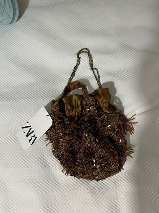 Bolso de mano con abalorios