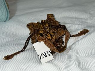 Bolso de mano con abalorios