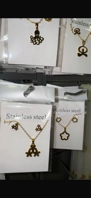 100 Conjuntos de acero( dorado y plateado)