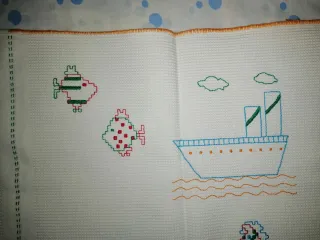 Copertina culla ricamata a mano