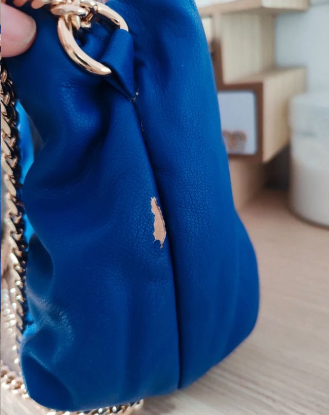 Bolso Lola Casademunt azul y dorado