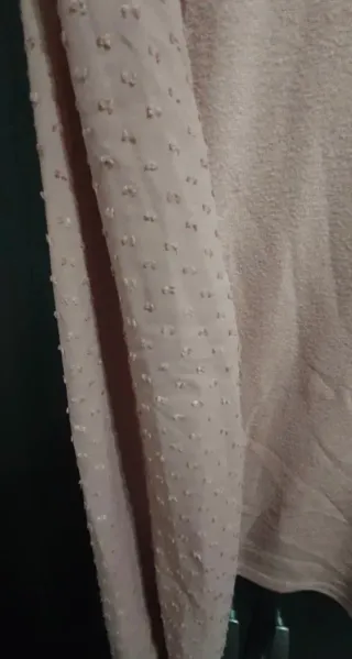 Jersey rosa cuello alto manga abullonada