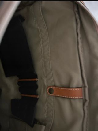 Maletín portátil verde y marrón