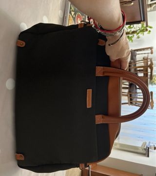 Maletín portátil verde y marrón