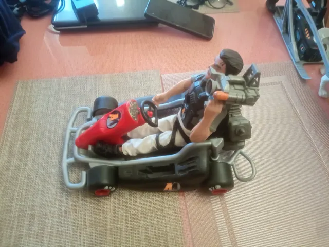 Action Man in Kart Car e conducente con fotocamera