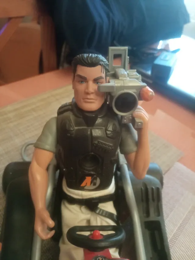 Action Man in Kart Car e conducente con fotocamera
