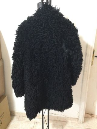 Giaccone in astrakan fatto a mano