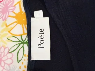 Vestido azul con volantes y detalles estampado cua