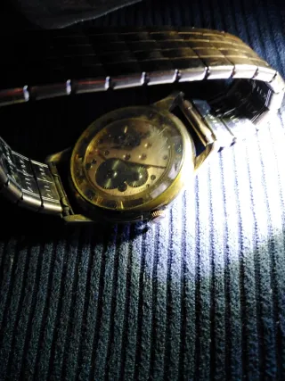 Reloj Tissot Automático Oro y Plata