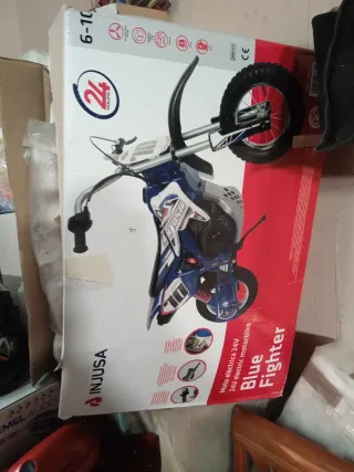 Moto eléctrica infantil azul, injusa 24 voltios