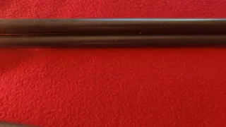 Estantería negra con colgador