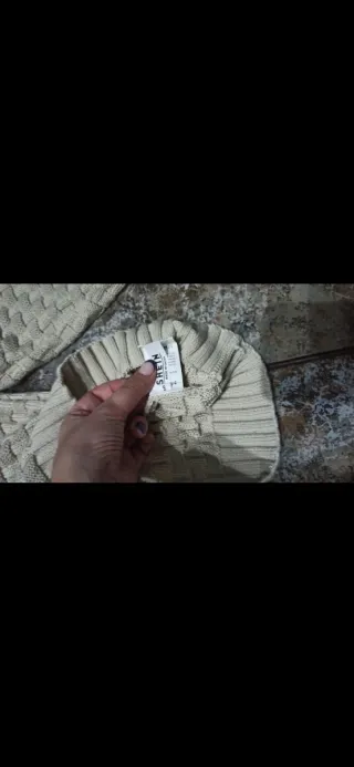 Jersey de punto grueso cuello alto