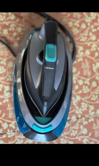 Centro de planchado azul y gris