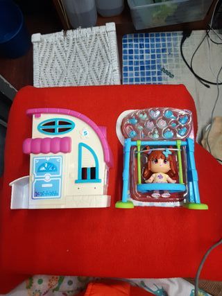 Muñeca con casa y columpio