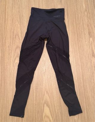 Mallas deportivas Oysho negras morado oscuro