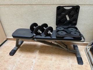 Banco de abdominales y pesas