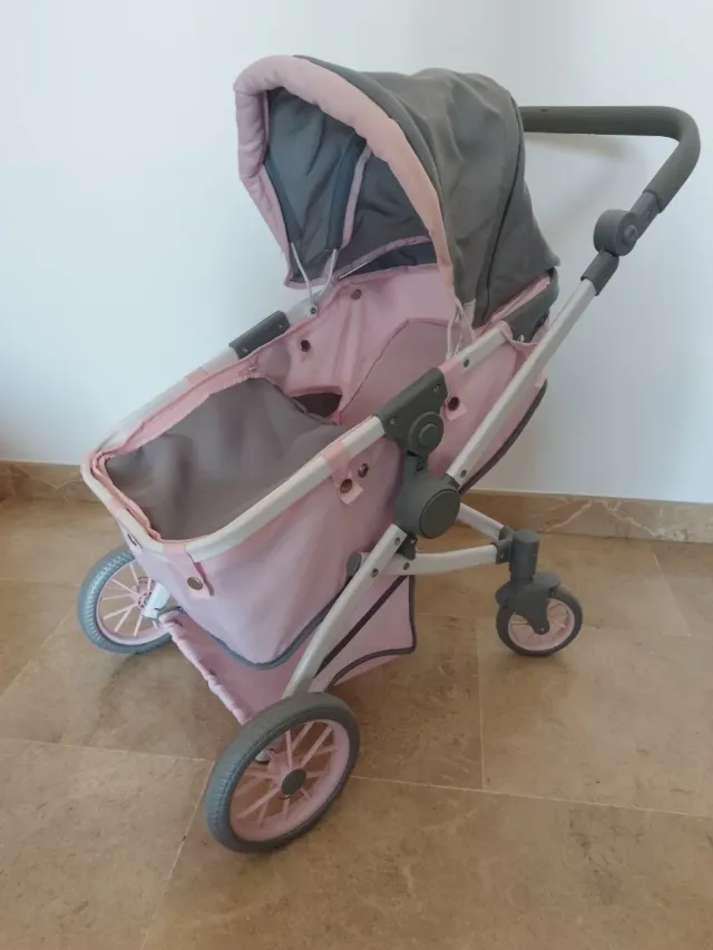 Carrito de muñecas rosa y gris
