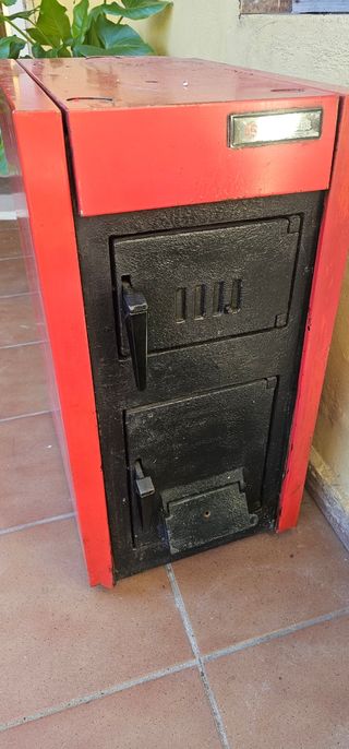 Caldera Roca NL 10-7 Carbon/Leña con bomba