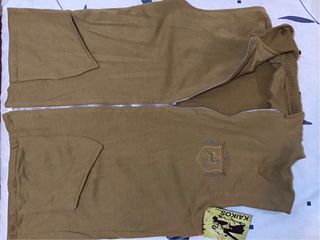 Chaleco con gorro. Mostaza. Zaidín - Granada.