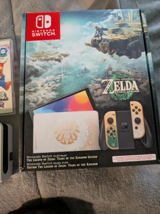 Pacchetto Nintendo Switch OLED Zelda + 4 Giochi